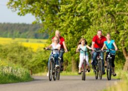 Family riding bikes, insurance