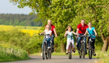 Family riding bikes, insurance